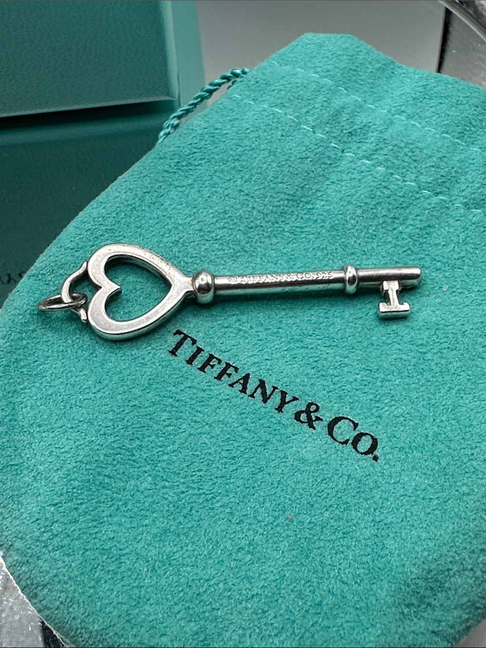 Tiffany & Co. Silver Heart Key Pendant on Turquoise Pouch